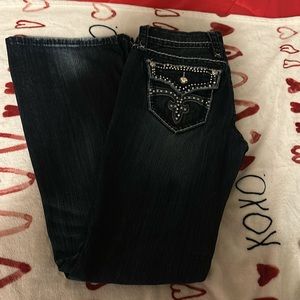 Rock revival boot, cut jeans